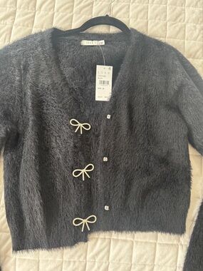 Lush Black Fuzzy Bow-Accent Cropped Cardigan